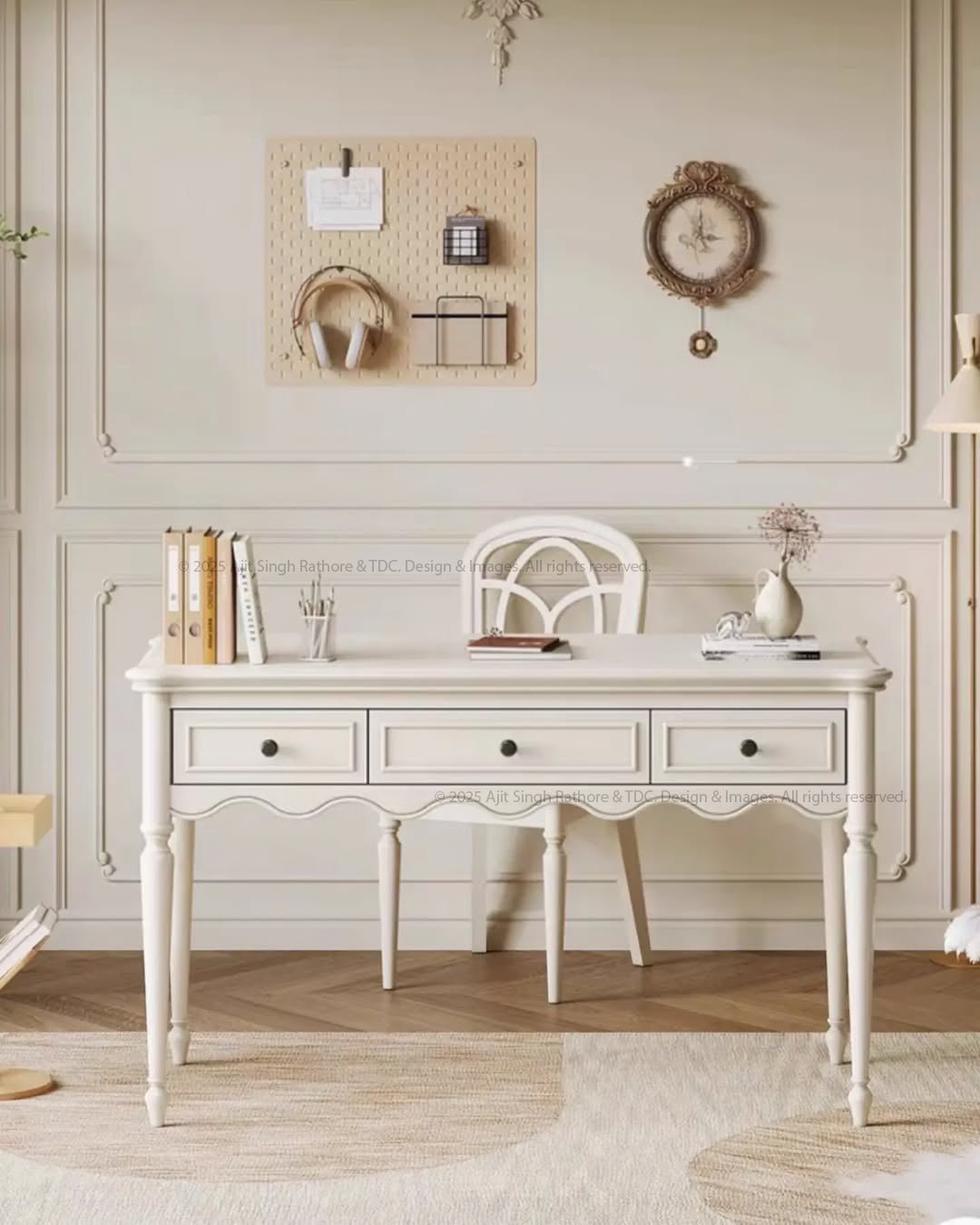 A white writing secretary desk with three drawers and a matching chair set in a room with wooden flooring and decorative wall treatments.