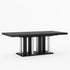 Black dining table with silver cylindrical legs