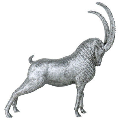 A metallic silver ram figurine with long curved horns, shown in profile against a plain white background.