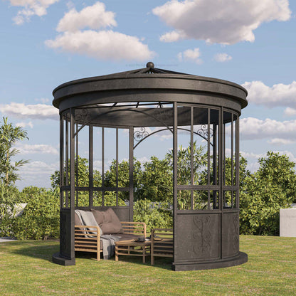 Black metal gazebo with outdoor furniture on a grassy area with trees and blue sky in the background