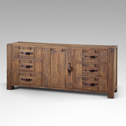 Wooden sideboard with multiple drawers and a door on a gray background